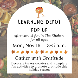 A fall-themed promotional flyer features a large white arched panel centered over a dimmed background of food, including bread, vegetables, fruit, citrus slices, and bowls of sauces. At the top of the panel is a small turkey made from a round cookie, with candy-corn feathers, candy eyes, a red wattle, and thin pretzel-stick legs and wings. Black text announces an after-school cooking and gratitude event, with a row of orange, yellow, and brown autumn leaves separating the event details from the description.